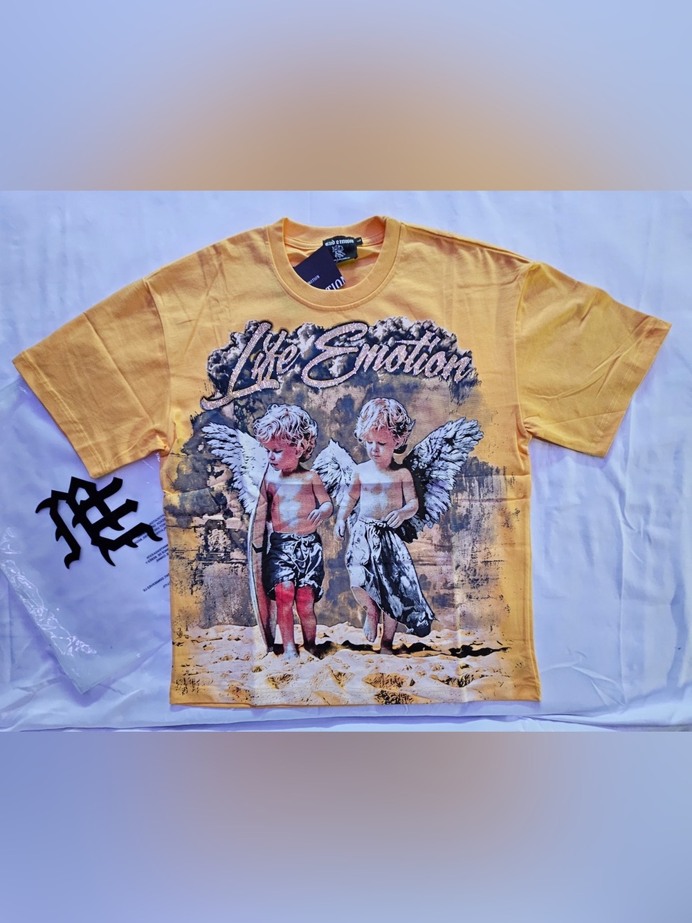 Mixed Emotion Yellow Graphic Tee with Angel Print & stones!